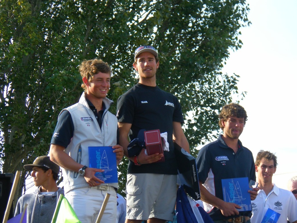 Sam Meech on the winners Podium at Laser Standard Junior Worlds in la Rochelle, France © John Bullot